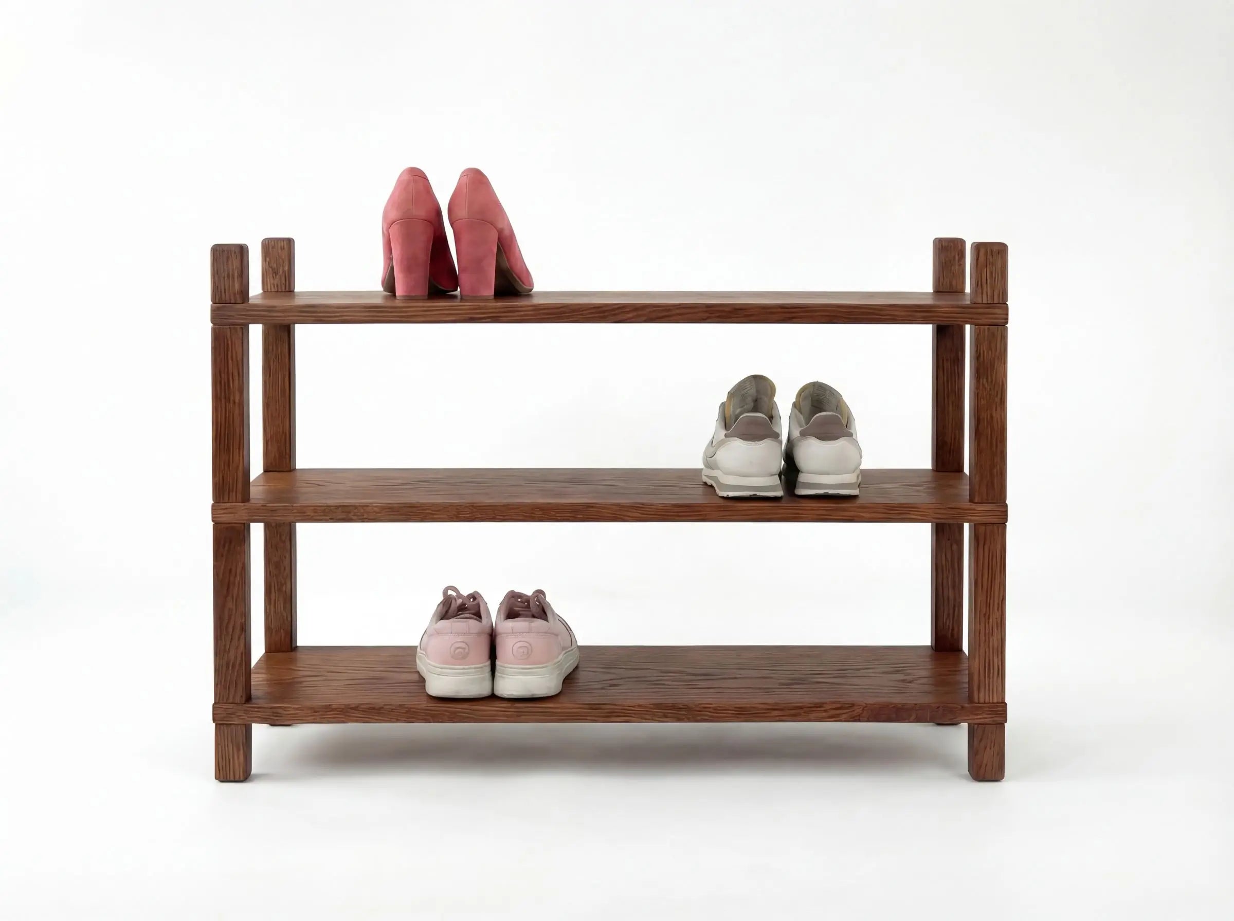 Wooden shoe rack with shoes on a white background