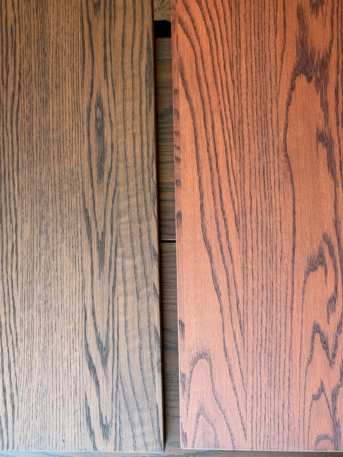 Dark brown and brown finished oak shelf boards side by side showing the stained grain