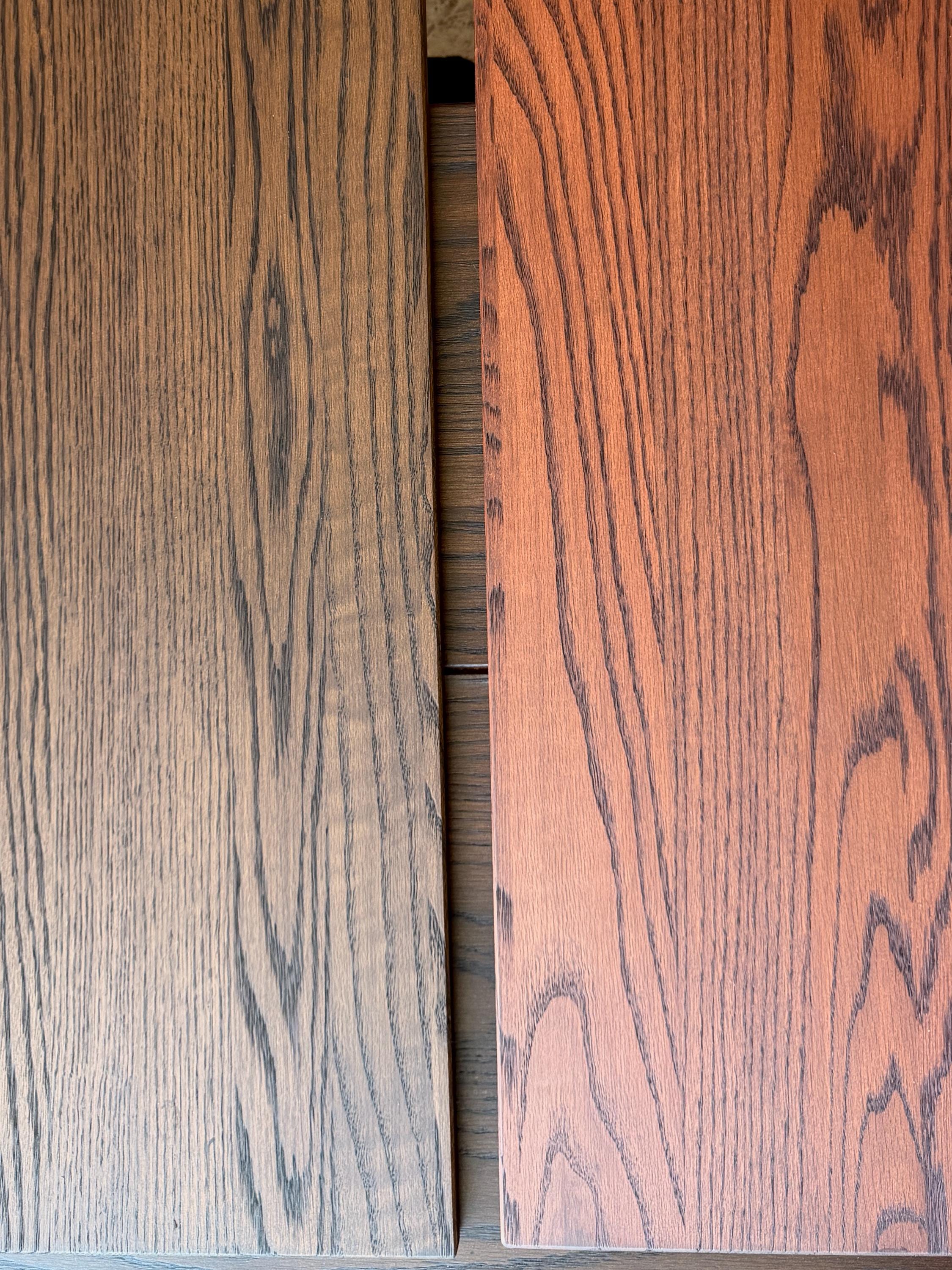 Dark brown and brown finished oak shelf boards side by side showing the stained grain