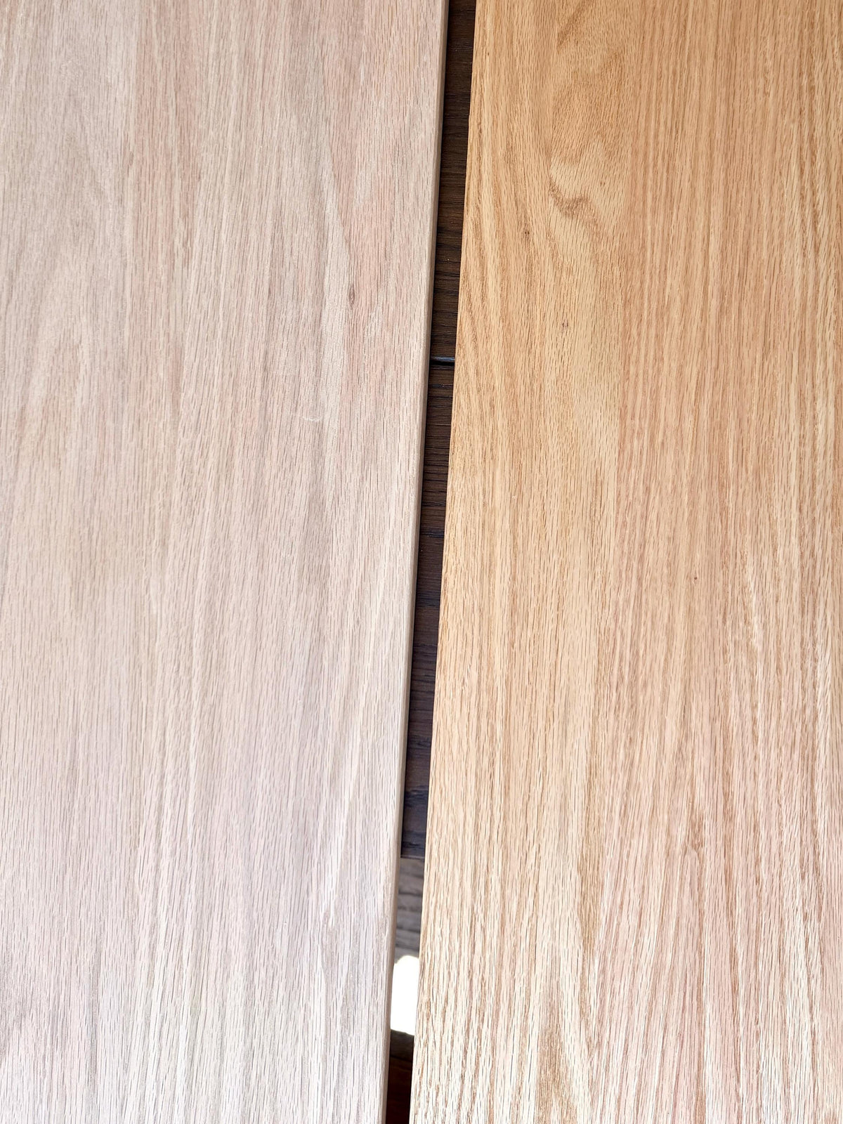 Two unfinished oak shelf boards side by side showing the natural variation in grain