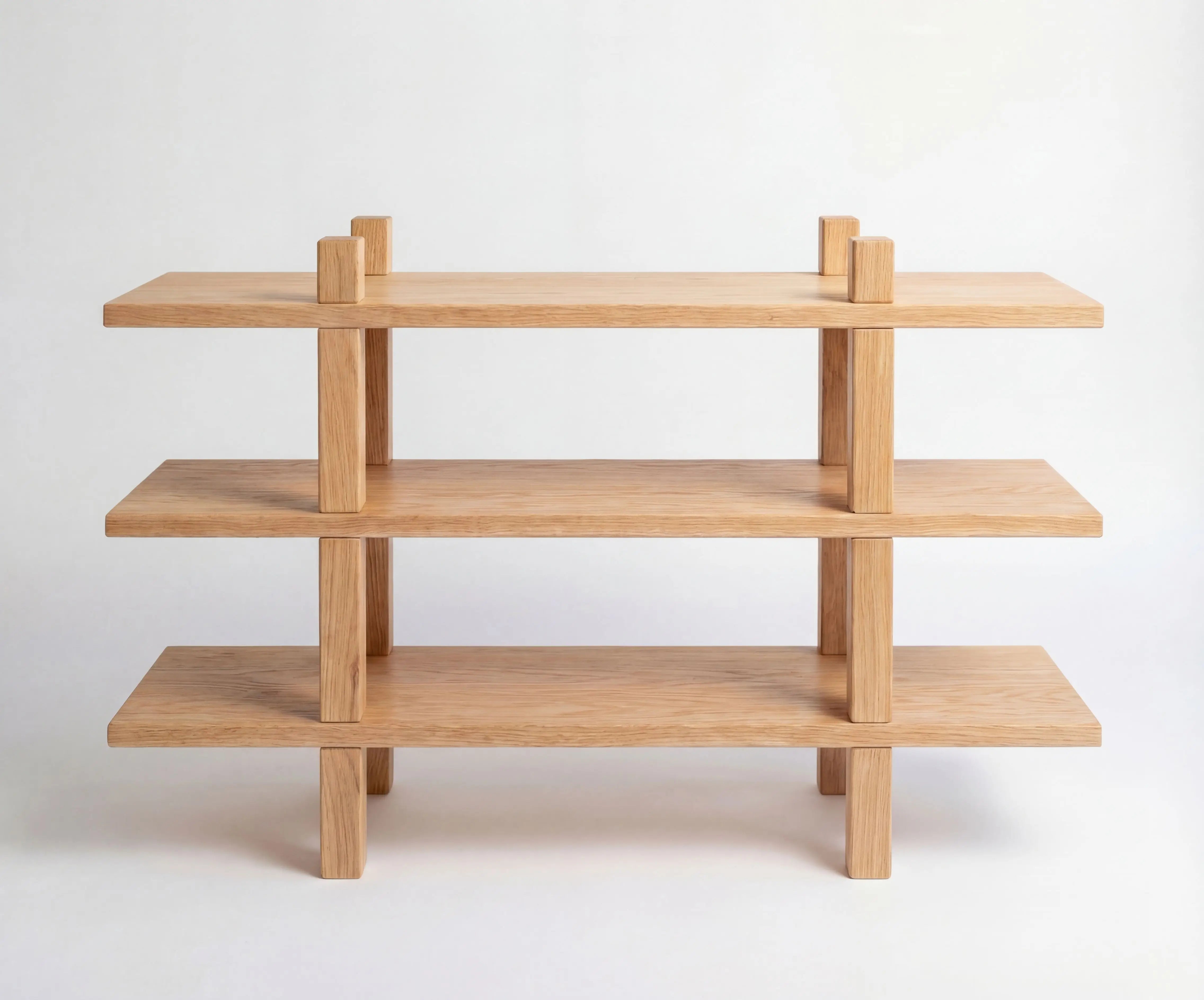 Wooden shelf with three tiers on a white background