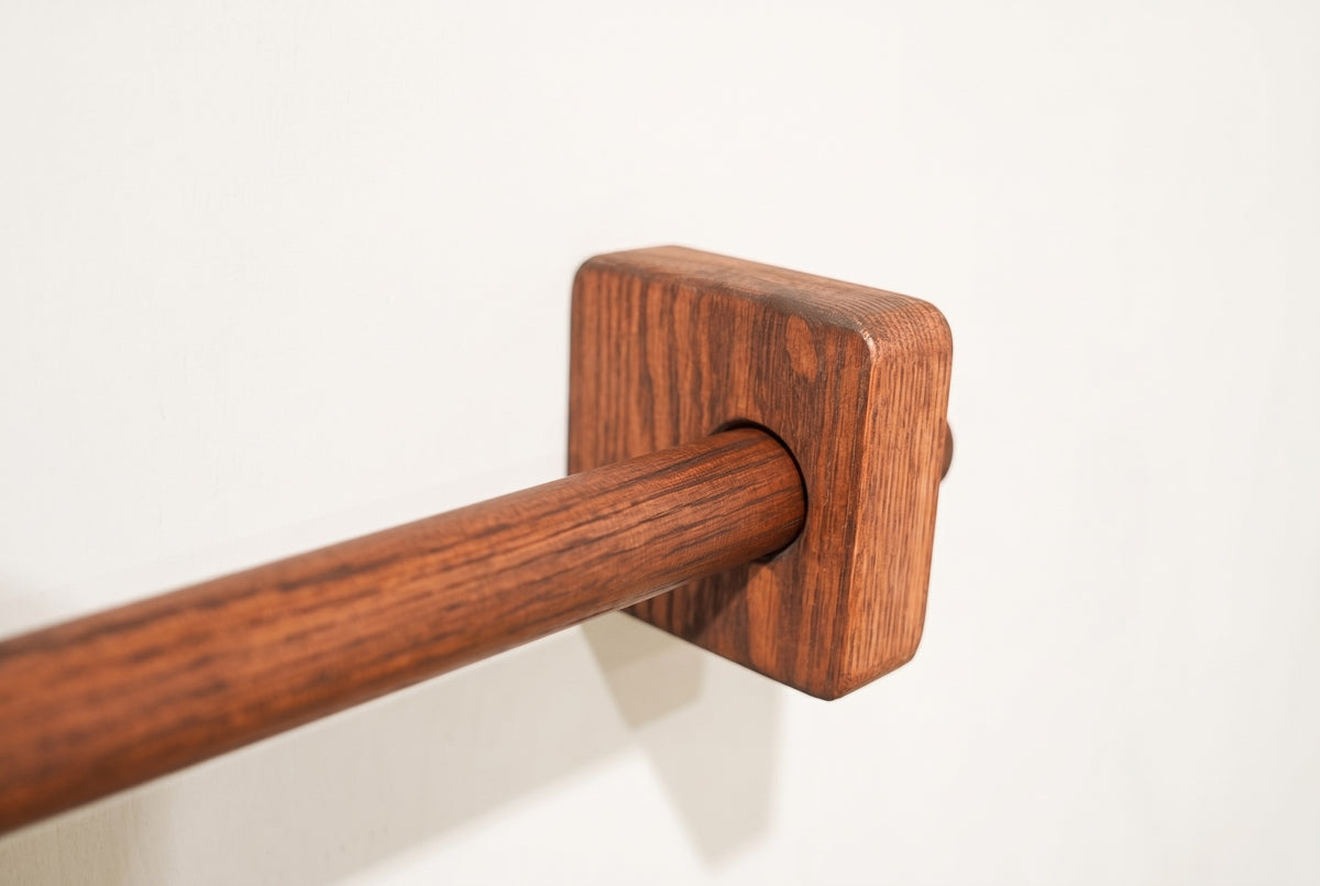 Brown | Brown oak curtain rod through a square solid oak bracket