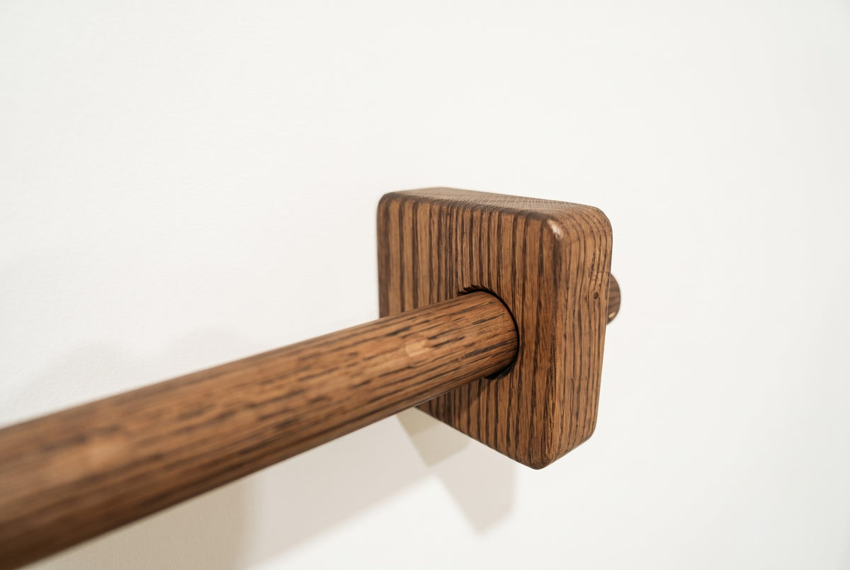 Dark brown | Dark brown oak curtain rod through a square solid oak bracket