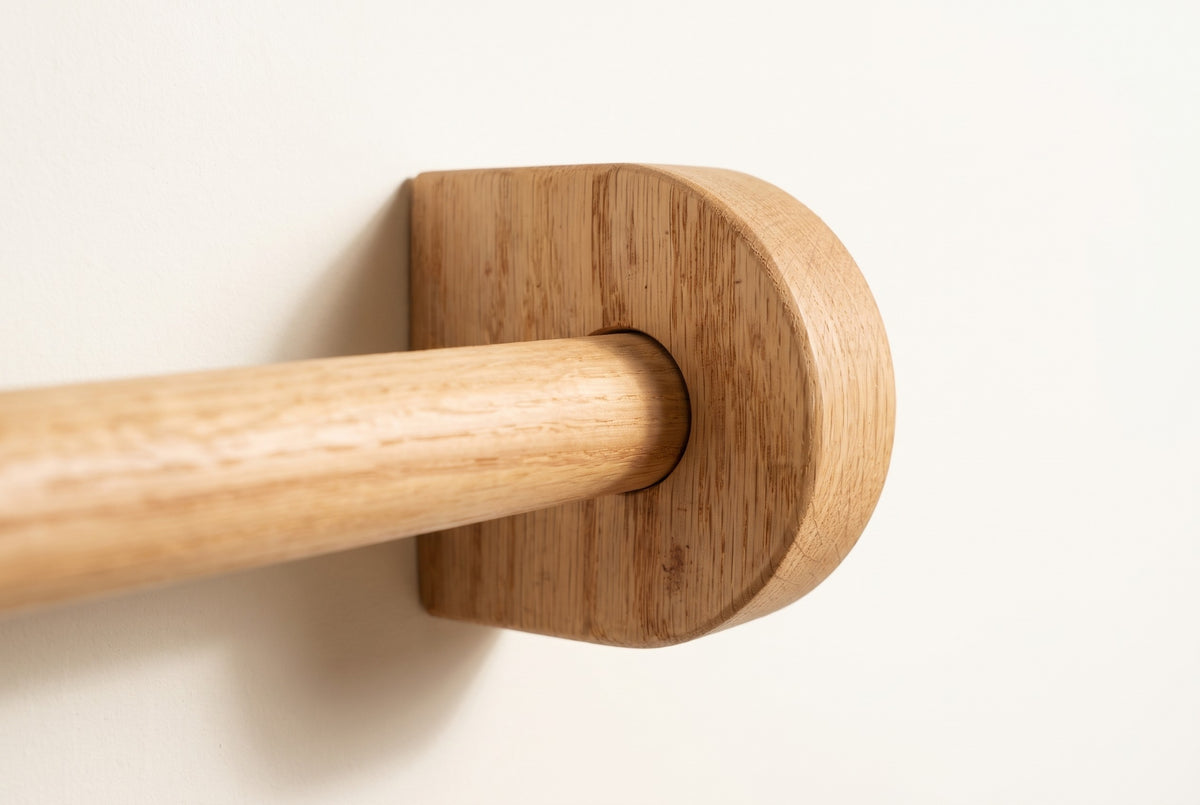 Natural | Natural oak curtain rod through a round solid oak bracket